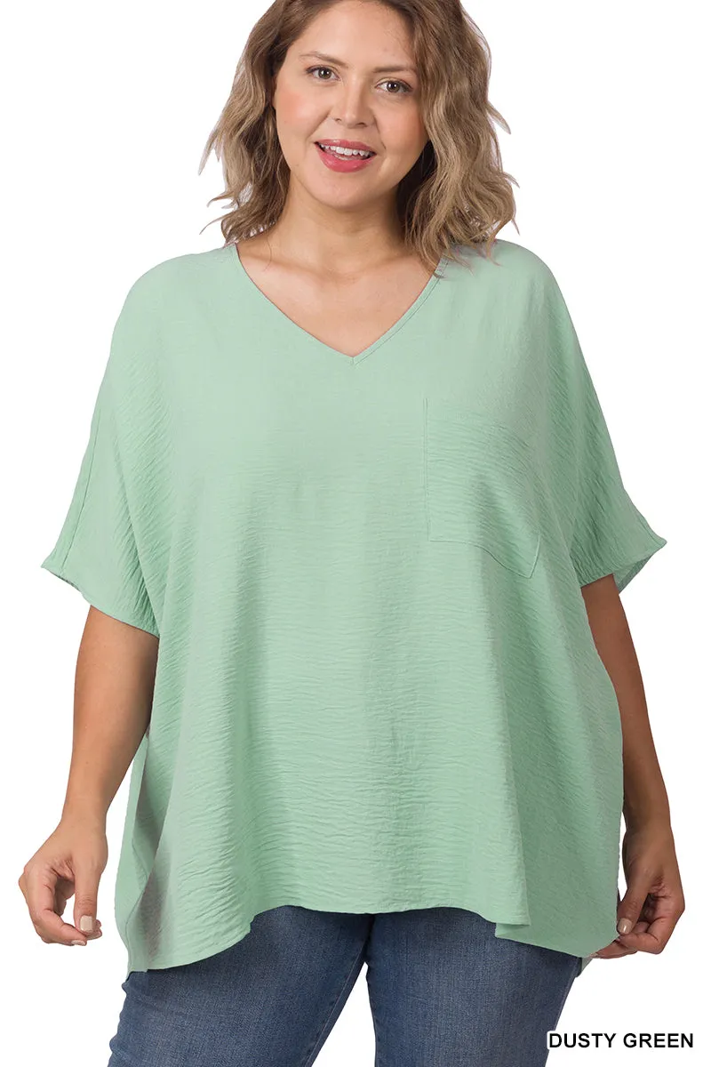 Plus Size V Neck Woven Airflow Dolman Short Sleeve Blouse Top with Front Pocket and Relaxed Fit