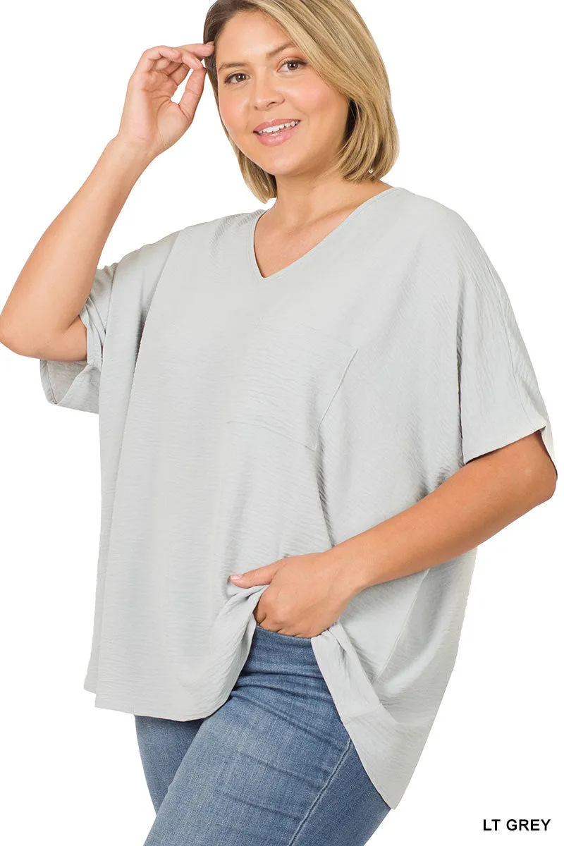 Plus Size V Neck Woven Airflow Dolman Short Sleeve Blouse Top with Front Pocket and Relaxed Fit