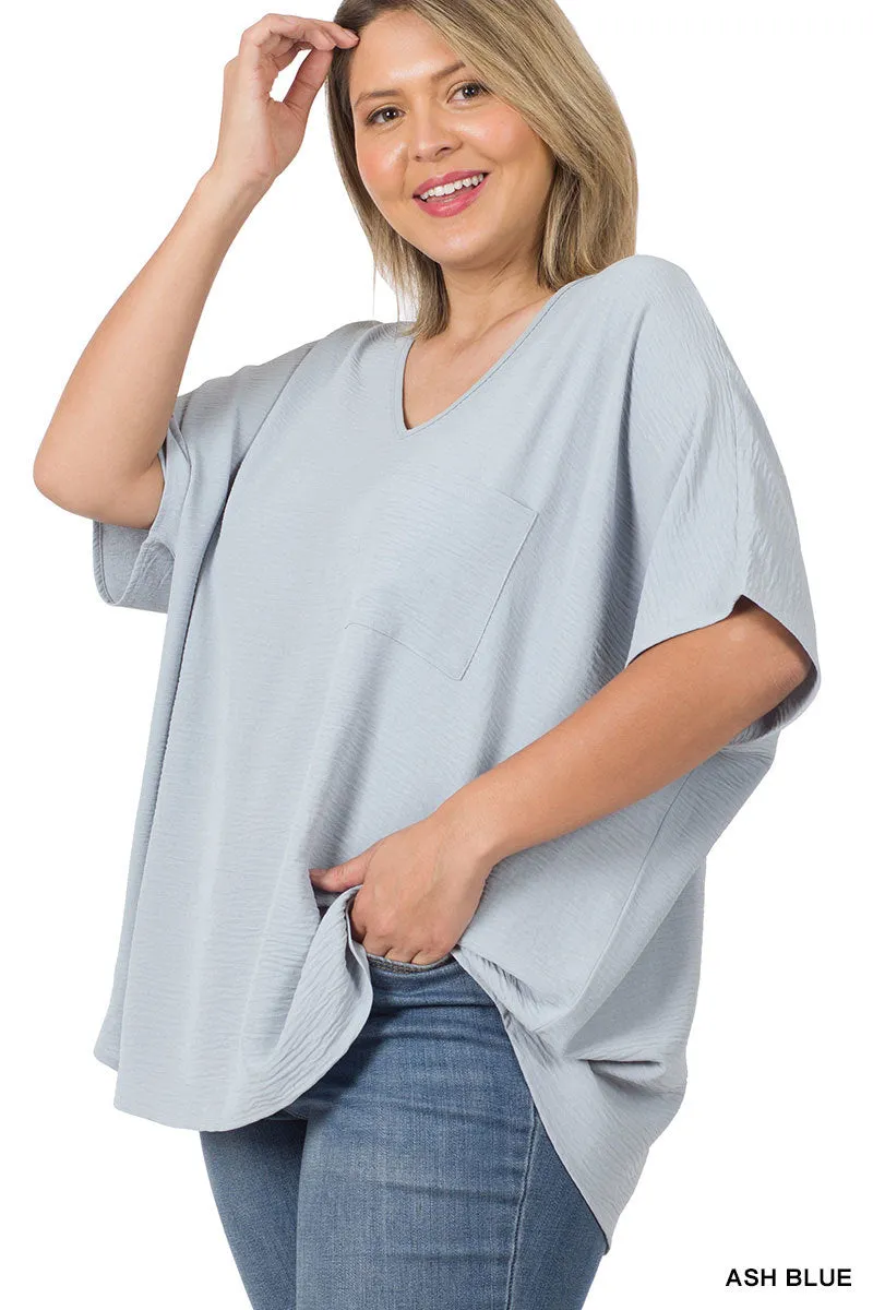 Plus Size V Neck Woven Airflow Dolman Short Sleeve Blouse Top with Front Pocket and Relaxed Fit