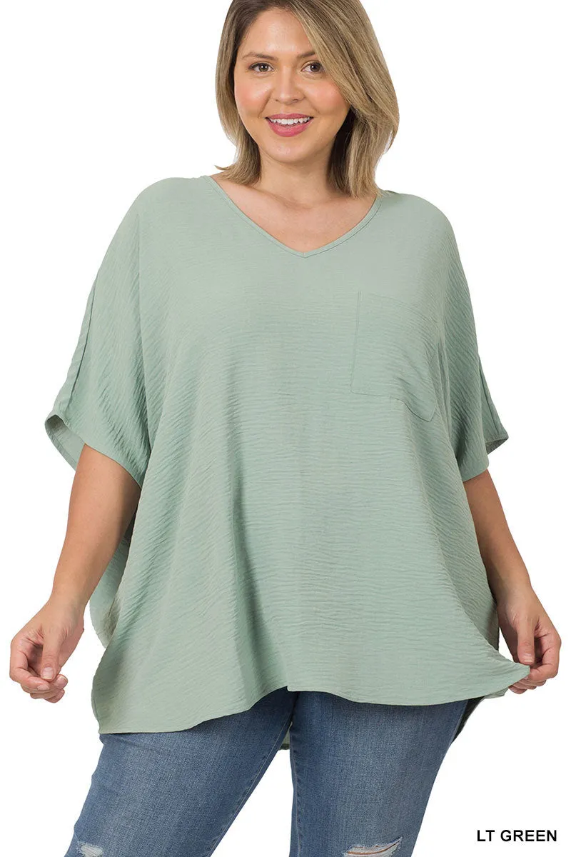 Plus Size V Neck Woven Airflow Dolman Short Sleeve Blouse Top with Front Pocket and Relaxed Fit