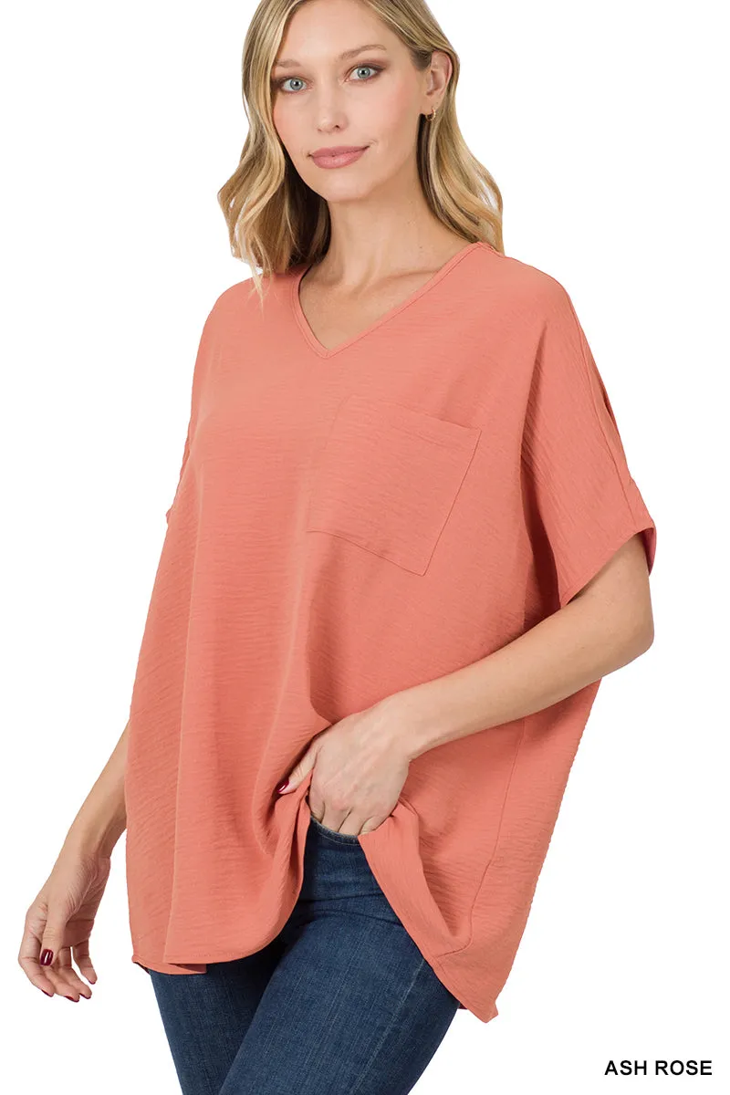 Plus Size V Neck Woven Airflow Dolman Short Sleeve Blouse Top with Front Pocket and Relaxed Fit