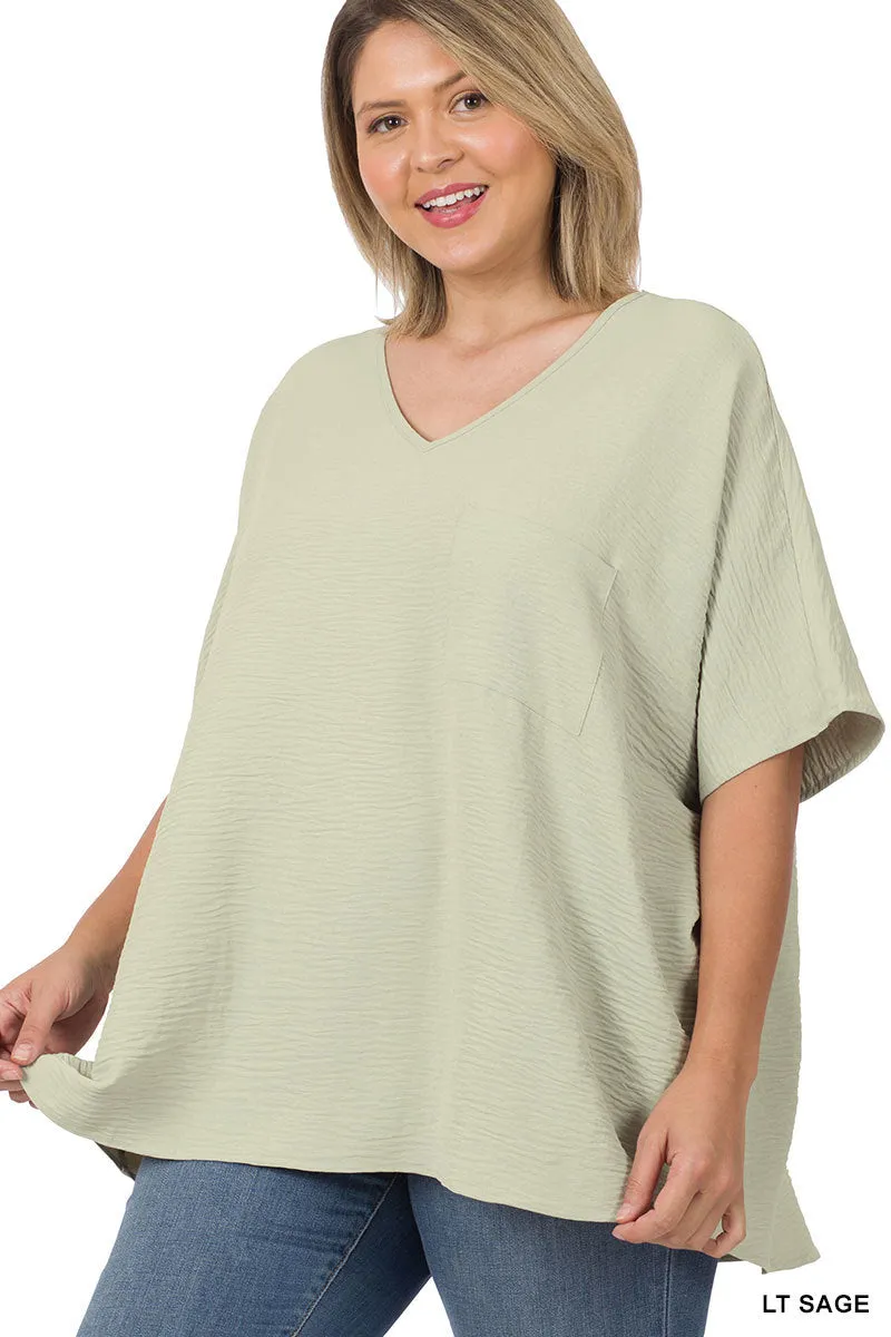 Plus Size V Neck Woven Airflow Dolman Short Sleeve Blouse Top with Front Pocket and Relaxed Fit